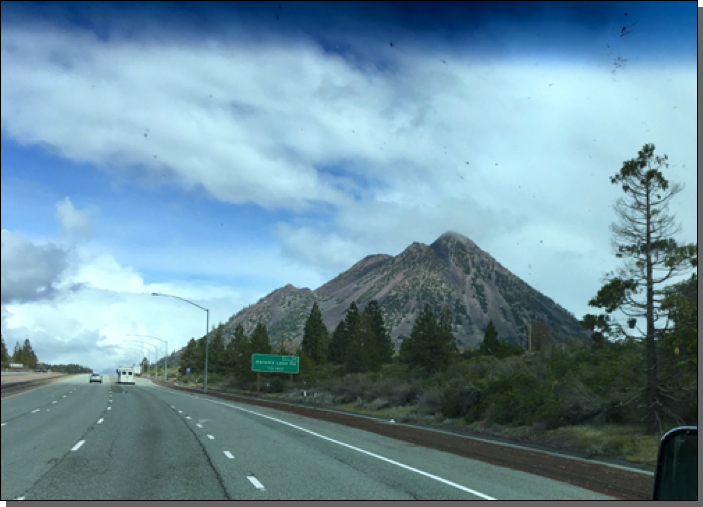 Black Butte, a cinder cone west of Mt. Shasta which you past by on the way north on I-5 going into the Siskiyous Mountains.