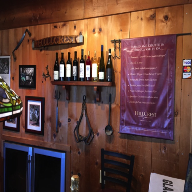 Wall behind tasting bar at Hillcrest Winery