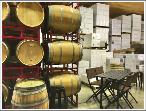 Barrels and boxes of wine